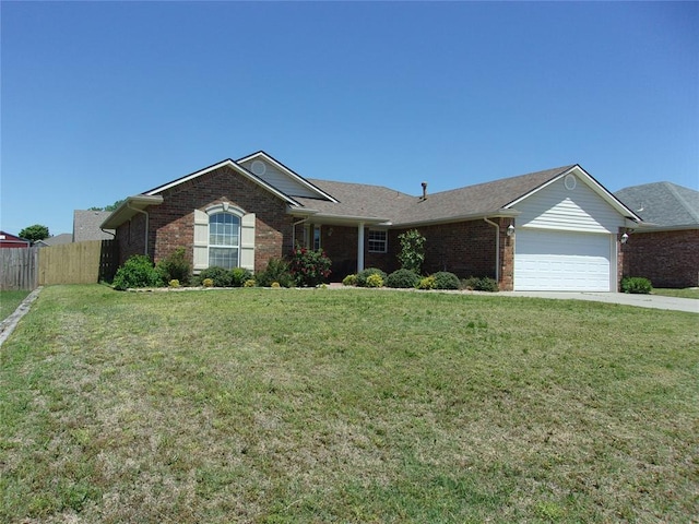 1926 E Aspen Pl, Shawnee, OK 74804 - single story home with brick siding, a garage, and driveway