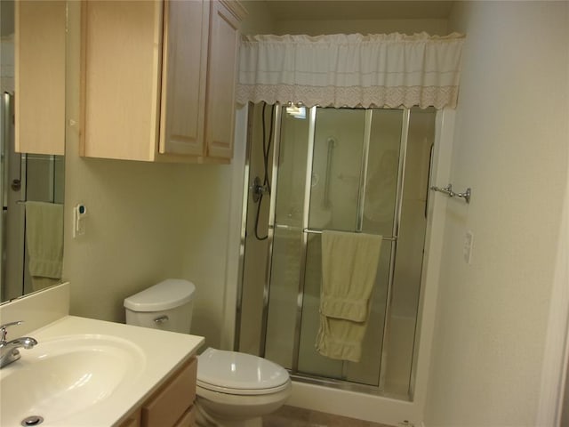 1926 E Aspen Pl, Shawnee, OK 74804 - full bathroom featuring a shower stall, toilet, and vanity