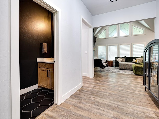 1614 S 1st Ave, Stroud, OK 74079 - hall featuring light wood finished floors and baseboards