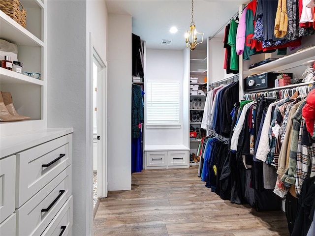 1614 S 1st Ave, Stroud, OK 74079 - spacious closet with light wood-style flooring