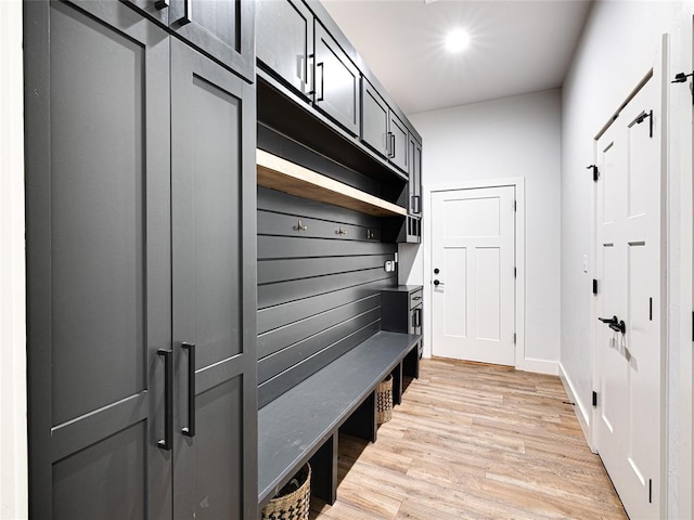 1614 S 1st Ave, Stroud, OK 74079 - mudroom featuring light wood-style floors and baseboards
