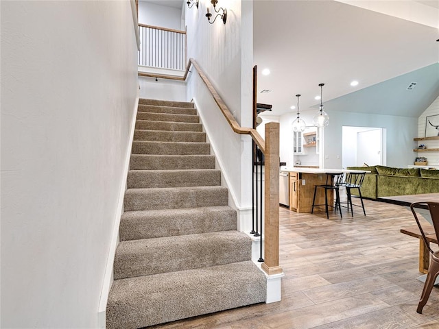 1614 S 1st Ave, Stroud, OK 74079 - stairway with wood finished floors, recessed lighting, and baseboards