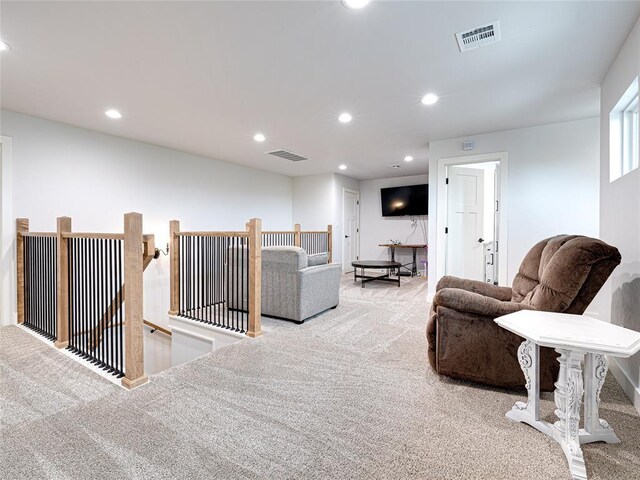 1614 S 1st Ave, Stroud, OK 74079 - carpeted living area featuring recessed lighting and baseboards