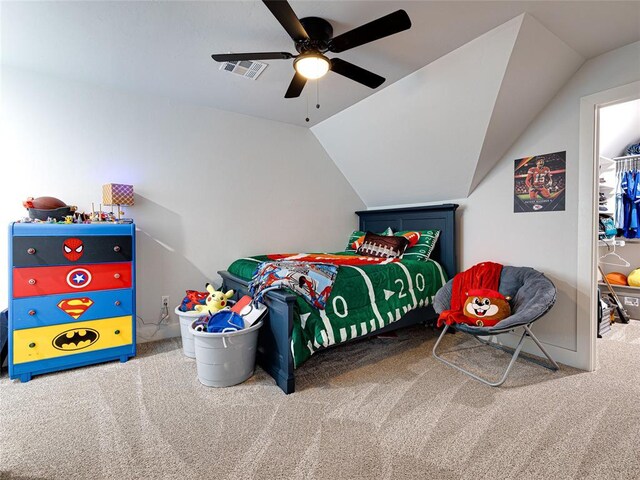 1614 S 1st Ave, Stroud, OK 74079 - bedroom with carpet, vaulted ceiling, a ceiling fan, and a spacious closet