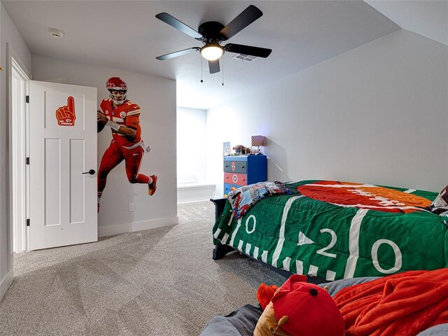 1614 S 1st Ave, Stroud, OK 74079 - carpeted bedroom with baseboards and a ceiling fan