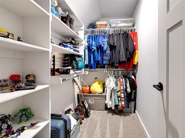 1614 S 1st Ave, Stroud, OK 74079 - walk in closet featuring carpet flooring