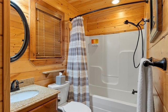 962 Red Fox Rd, Broken Bow, OK 74728 - bathroom featuring toilet, shower / bath combination with curtain, vanity, and wood walls