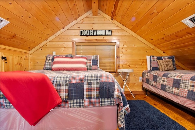 962 Red Fox Rd, Broken Bow, OK 74728 - bedroom featuring wood ceiling, lofted ceiling, wood finished floors, and wooden walls