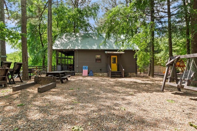 962 Red Fox Rd, Broken Bow, OK 74728 - view of outbuilding with entry steps and fence
