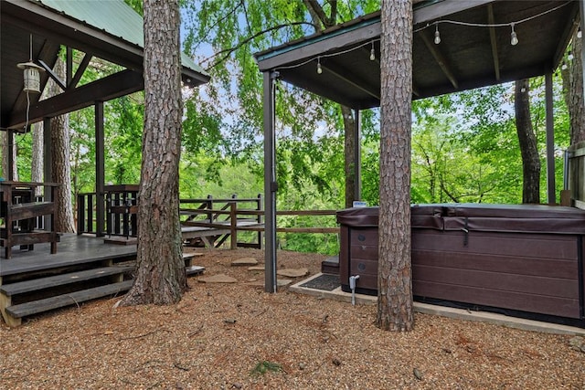 962 Red Fox Rd, Broken Bow, OK 74728 - view of yard with a hot tub and a wooden deck
