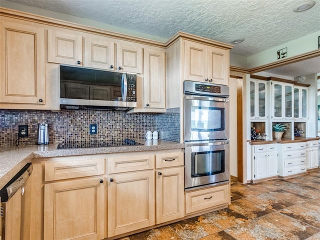 13776 E Stella Rd, Newalla, OK 74857 - kitchen featuring stainless steel appliances, light brown cabinetry, backsplash, dark stone finish flooring, and a textured ceiling