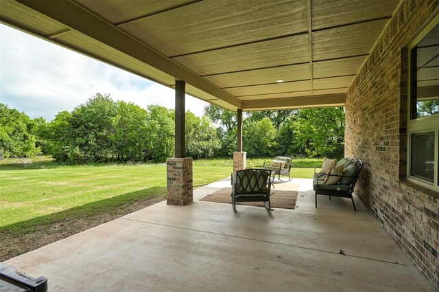 12535 Memory Ln, Edmond, OK 73025 - view of patio / terrace with view of scattered trees and outdoor lounge area