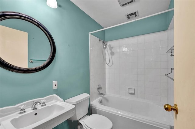 15001 Garr Pl, Oklahoma City, OK 73165 - bathroom with a sink, toilet, and bathtub / shower combination