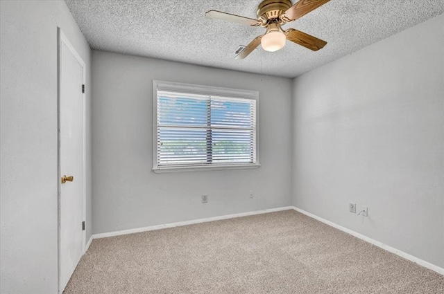 15001 Garr Pl, Oklahoma City, OK 73165 - carpeted spare room featuring a ceiling fan, a textured ceiling, and baseboards