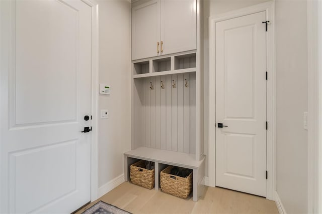 15012 Annecy Blvd, Oklahoma City, OK 73142 - mudroom with baseboards and light wood finished floors