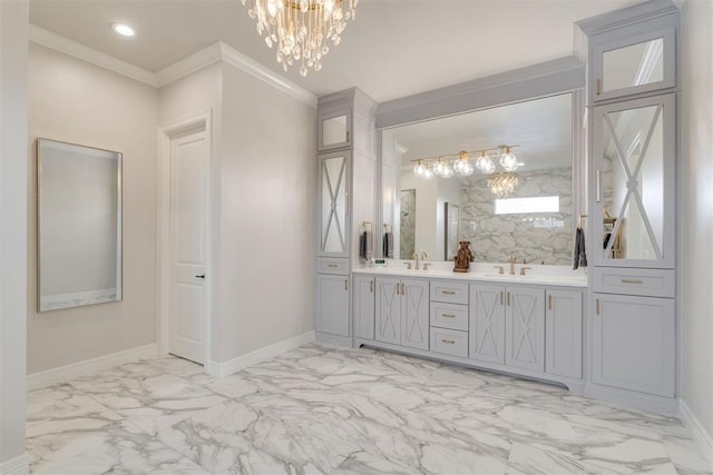 15012 Annecy Blvd, Oklahoma City, OK 73142 - bathroom featuring a chandelier, marble look tiles, ornamental molding, double vanity, and baseboards