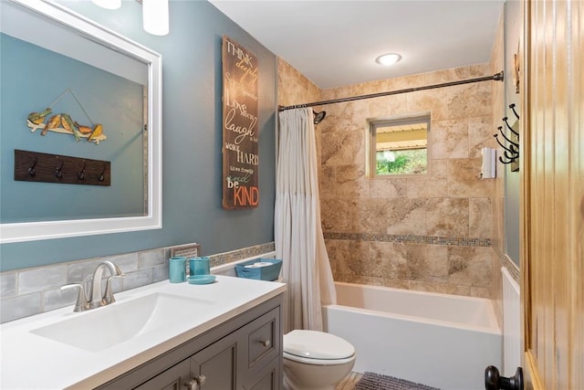 868 Red Fox Rd, Broken Bow, OK 74728 - bathroom with toilet, shower / bath combination with curtain, and vanity