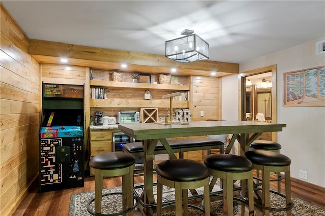 868 Red Fox Rd, Broken Bow, OK 74728 - bar featuring dark wood-style floors, wood walls, and wine cooler