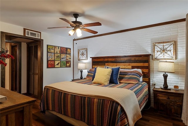 868 Red Fox Rd, Broken Bow, OK 74728 - bedroom featuring wood finished floors and ceiling fan