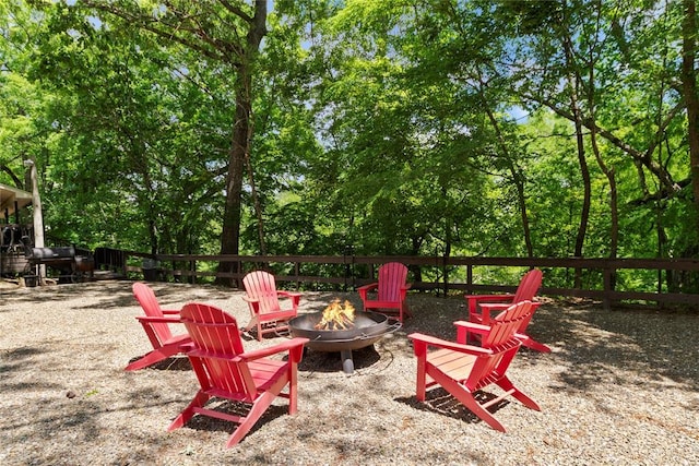 868 Red Fox Rd, Broken Bow, OK 74728 - view of patio with an outdoor fire pit