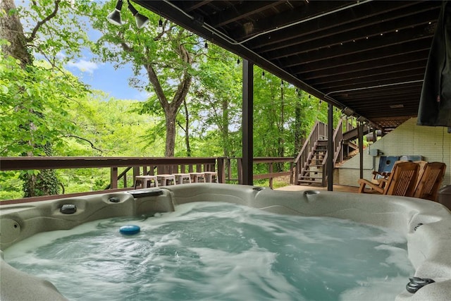 868 Red Fox Rd, Broken Bow, OK 74728 - wooden deck with stairs and a hot tub