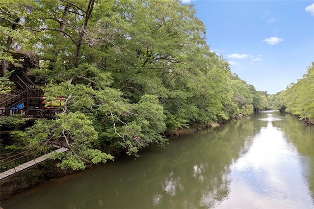 868 Red Fox Rd, Broken Bow, OK 74728 - water view featuring a heavily wooded area