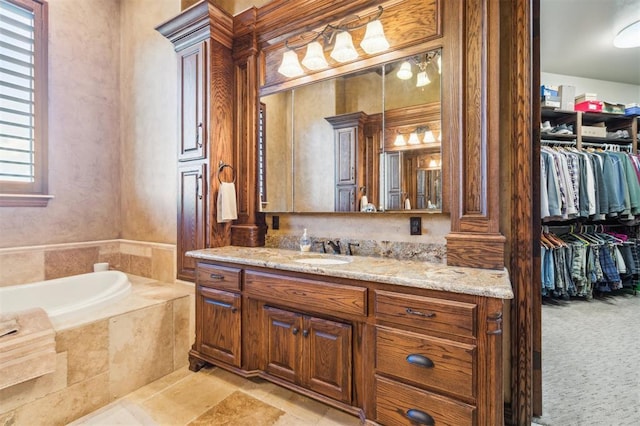 13600 W Britton Rd, Yukon, OK 73099 - full bath featuring vanity, a garden tub, and a walk in closet