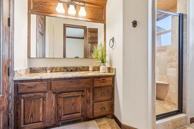 13600 W Britton Rd, Yukon, OK 73099 - bathroom featuring a shower stall, vanity, and baseboards