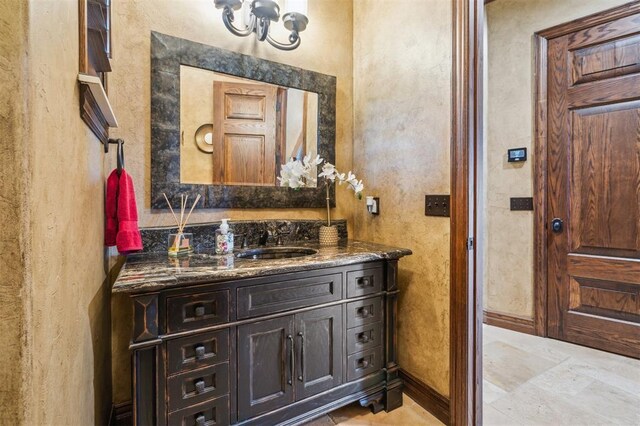13600 W Britton Rd, Yukon, OK 73099 - bathroom featuring vanity and a textured wall