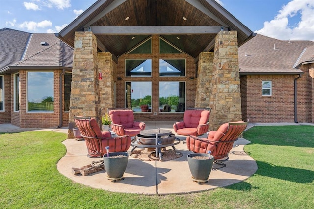 13600 W Britton Rd, Yukon, OK 73099 - view of patio with an outdoor living space with a fire pit