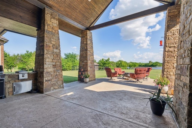 13600 W Britton Rd, Yukon, OK 73099 - view of patio with an outdoor kitchen