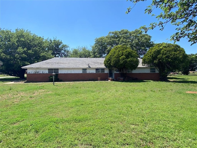 20403 E County Road 1567, Altus, OK 73521 - view of front facade featuring a front lawn and brick siding