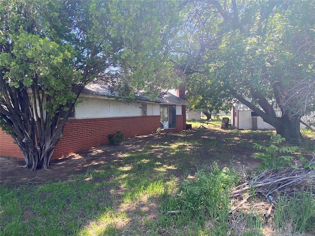 20403 E County Road 1567, Altus, OK 73521 - view of yard with a storage unit and an outdoor structure