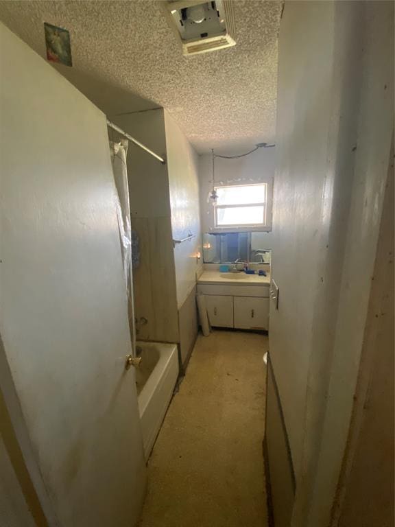 20403 E County Road 1567, Altus, OK 73521 - full bath with a textured ceiling, shower / tub combo, and vanity