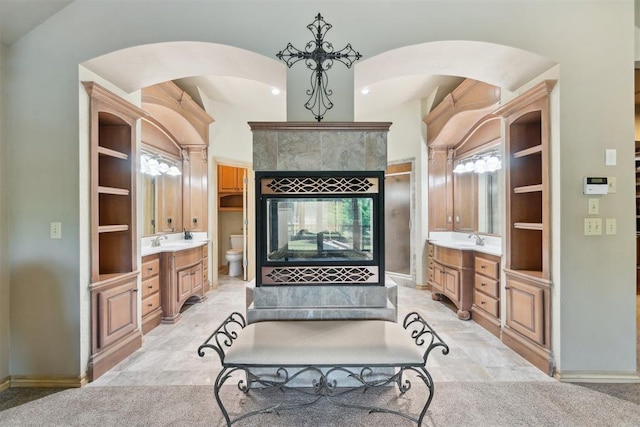 20180 Elm St, Harrah, OK 73045 - bathroom featuring toilet, vanity, a bathtub, built in features, and recessed lighting