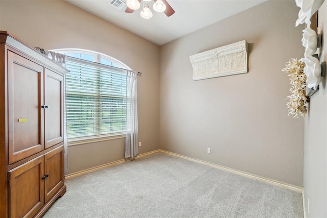 20180 Elm St, Harrah, OK 73045 - empty room with a ceiling fan, light carpet, plenty of natural light, and baseboards