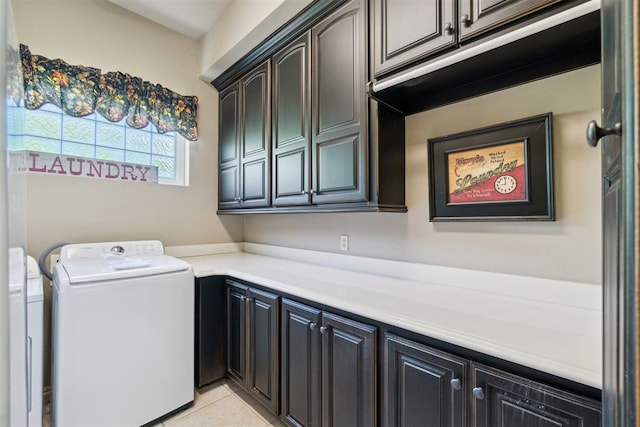 20180 Elm St, Harrah, OK 73045 - laundry room with cabinet space, washer and dryer, and light tile patterned floors