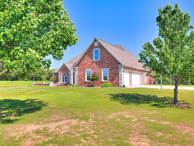 349412 E 840th Rd, Stroud, OK 74079 - traditional-style house featuring brick siding, driveway, an attached garage, and a front yard