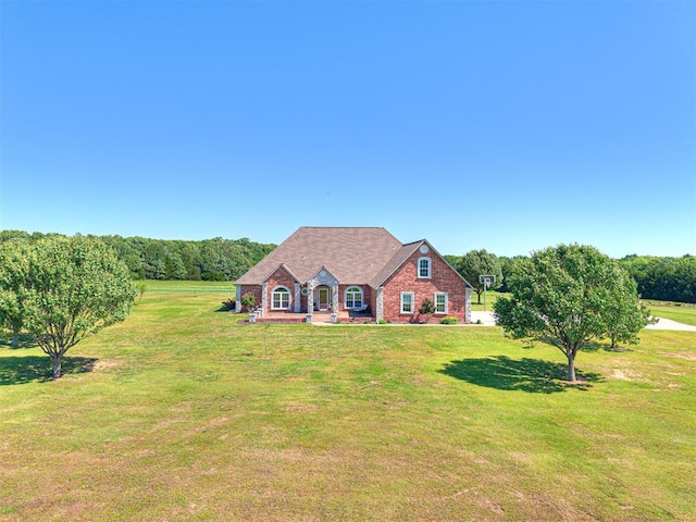 349412 E 840th Rd, Stroud, OK 74079 - view of front facade with a front yard and brick siding