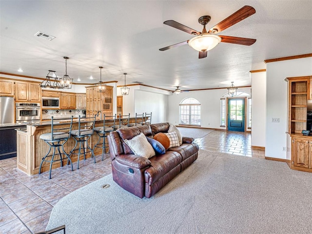 349412 E 840th Rd, Stroud, OK 74079 - living room featuring crown molding, ceiling fan, light tile patterned floors, recessed lighting, and a chandelier