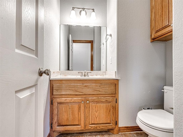 349412 E 840th Rd, Stroud, OK 74079 - half bath featuring vanity, toilet, and a textured wall