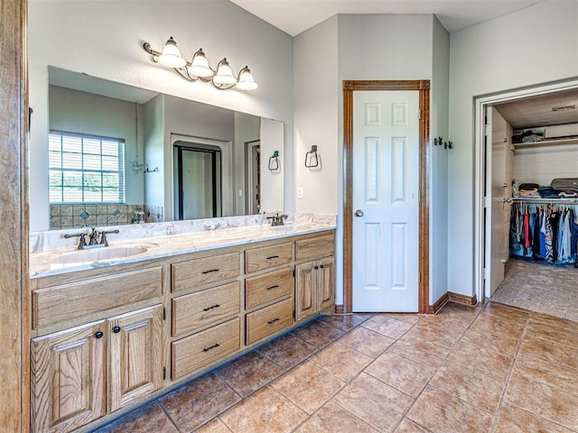 349412 E 840th Rd, Stroud, OK 74079 - bathroom featuring double vanity and a walk in closet