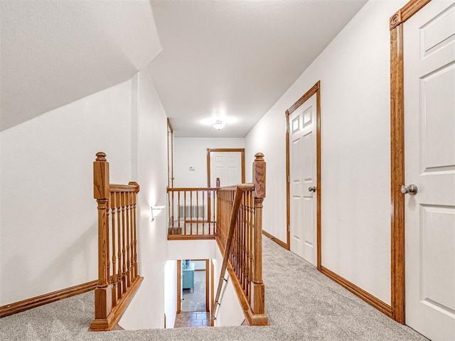 349412 E 840th Rd, Stroud, OK 74079 - corridor featuring an upstairs landing, carpet floors, and baseboards