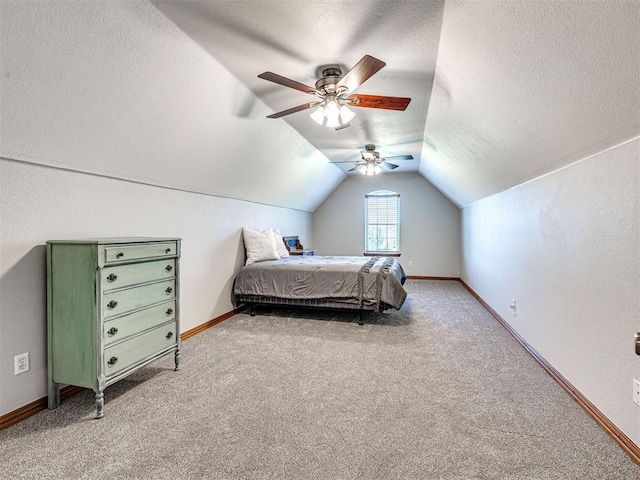 349412 E 840th Rd, Stroud, OK 74079 - bedroom featuring lofted ceiling, light colored carpet, a textured ceiling, baseboards, and ceiling fan