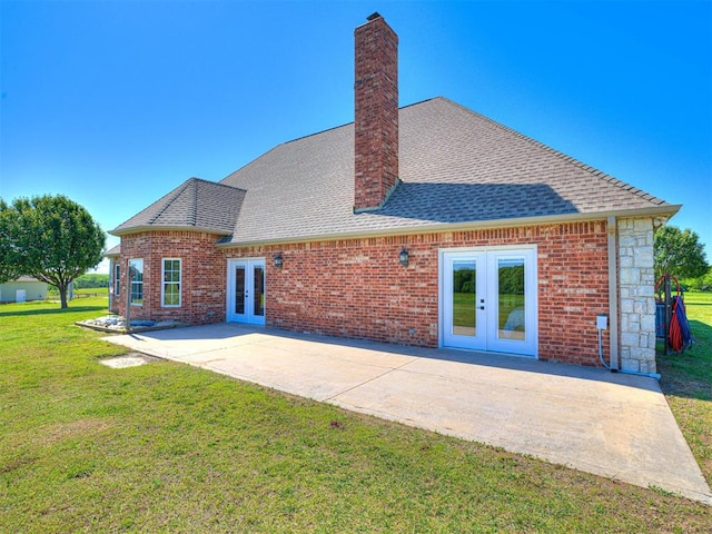 349412 E 840th Rd, Stroud, OK 74079 - back of property with french doors, a chimney, a yard, and a shingled roof