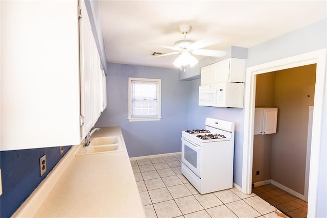 4620 SE 139th St, Oklahoma City, OK 73165 - kitchen with white appliances, a sink, ceiling fan, light tile patterned floors, and light countertops