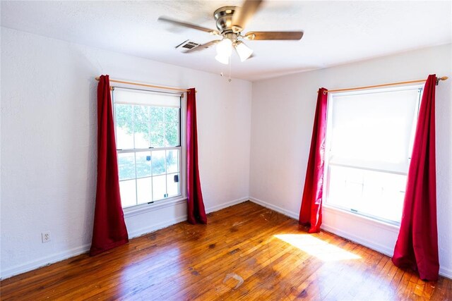 4620 SE 139th St, Oklahoma City, OK 73165 - unfurnished room with wood-type flooring, ceiling fan, and baseboards