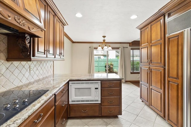 5839 Hefner Village Ct, Oklahoma City, OK 73162 - kitchen with built in appliances, a peninsula, decorative backsplash, ventilation hood, and light stone counters