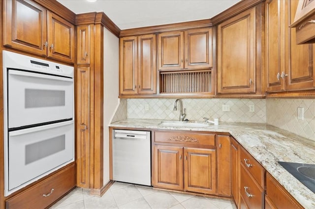 5839 Hefner Village Ct, Oklahoma City, OK 73162 - kitchen featuring white appliances, a sink, backsplash, and brown cabinets