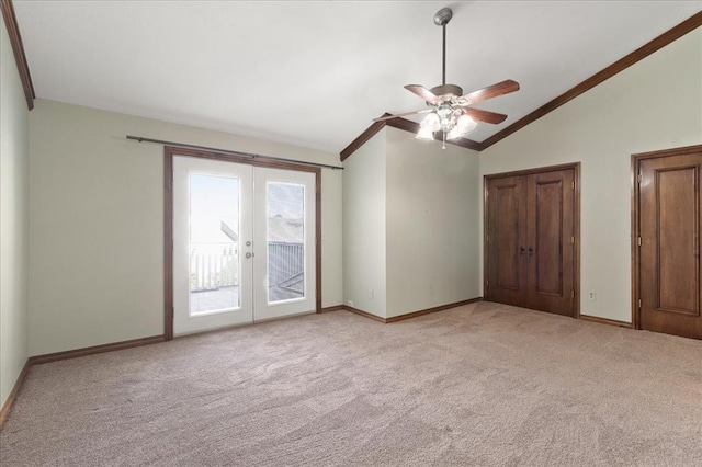 5839 Hefner Village Ct, Oklahoma City, OK 73162 - unfurnished bedroom with access to outside, lofted ceiling, light colored carpet, french doors, and baseboards